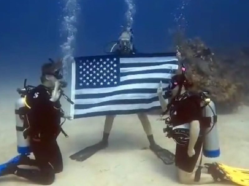 US flag showing under water